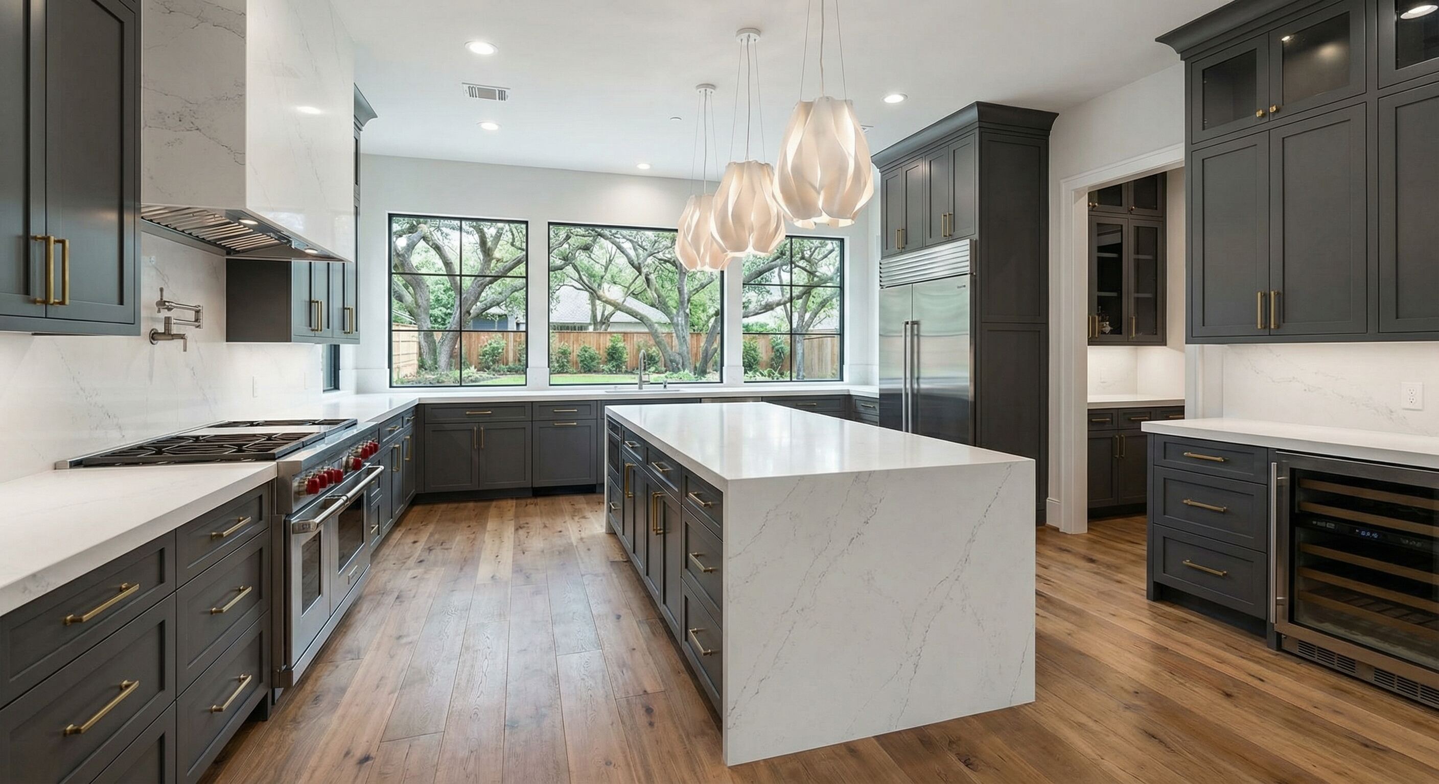 Modern Houston kitchen renovation with white cabinets and quartz countertops